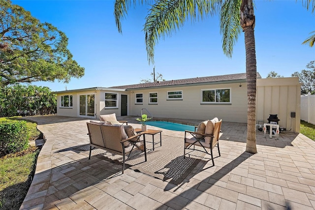 rear view of property with a patio area