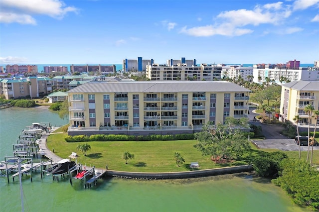 drone / aerial view featuring a water view