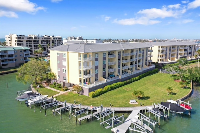 birds eye view of property with a water view