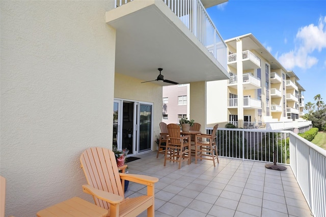 view of patio featuring ceiling fan