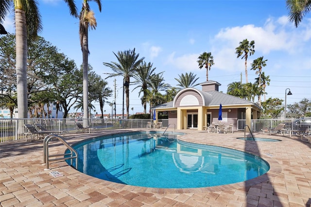 view of swimming pool with a patio area