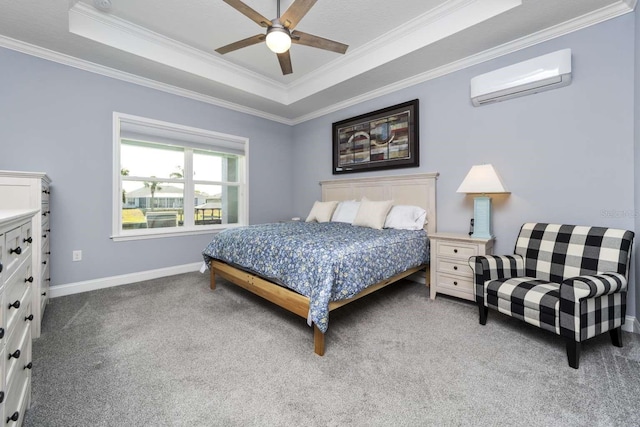 bedroom with ornamental molding, a raised ceiling, ceiling fan, an AC wall unit, and carpet floors