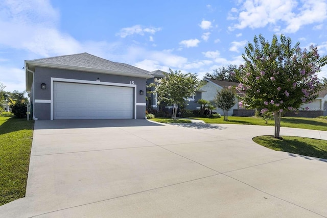 15 Cold Spring Ct, Palm Coast, FL 32137 - view of front of property featuring driveway, a front lawn, an attached garage, and stucco siding
