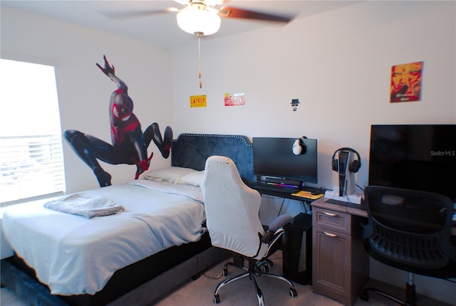 bedroom featuring ceiling fan and light colored carpet