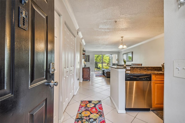 kitchen featuring dishwasher, a notable chandelier, a textured ceiling, light tile patterned floors, and ornamental molding