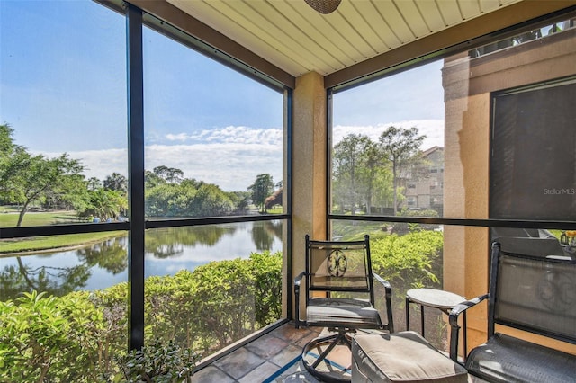 sunroom with a water view