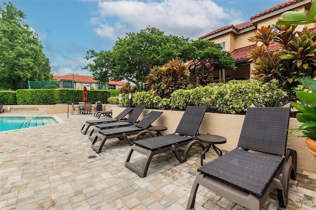 view of patio / terrace with a community pool