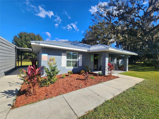 single story home with a front yard