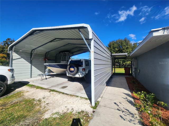 view of parking / parking lot with a carport