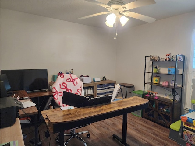 home office featuring ceiling fan and hardwood / wood-style floors