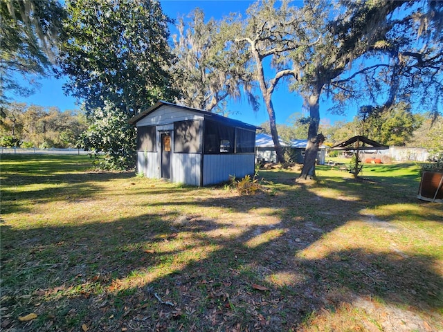 view of yard with a storage unit