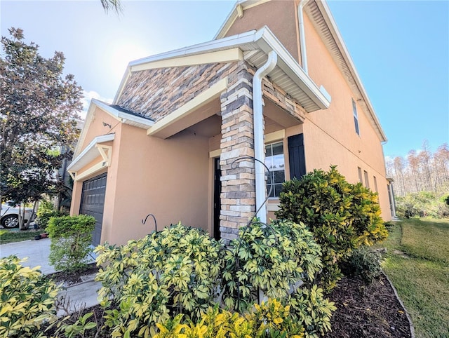 view of property exterior featuring a garage