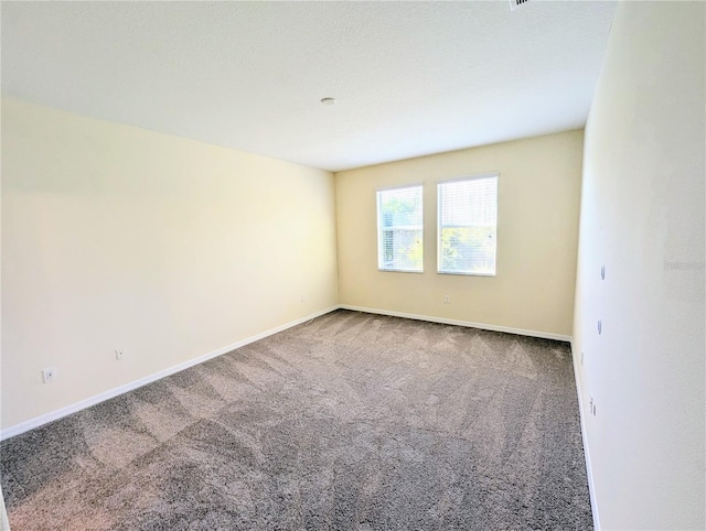 empty room with carpet floors