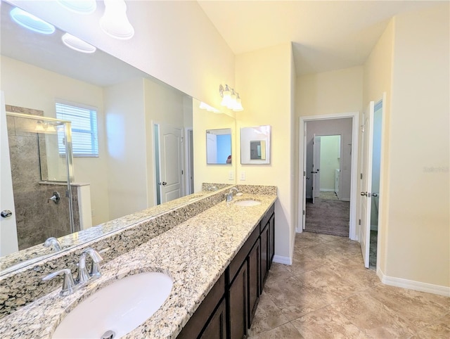 bathroom with vanity and an enclosed shower