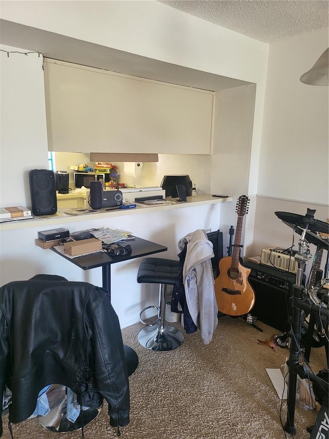 office with a textured ceiling