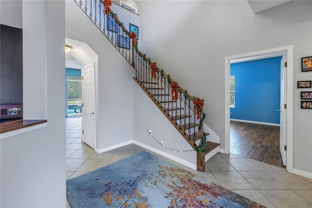 stairway featuring hardwood / wood-style floors