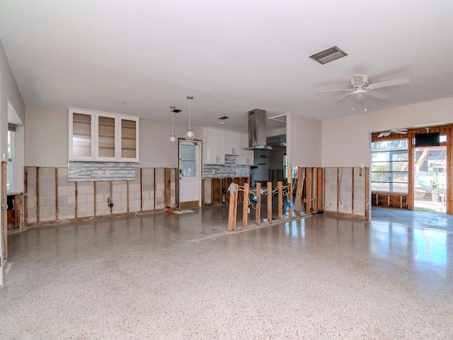 interior space featuring ceiling fan