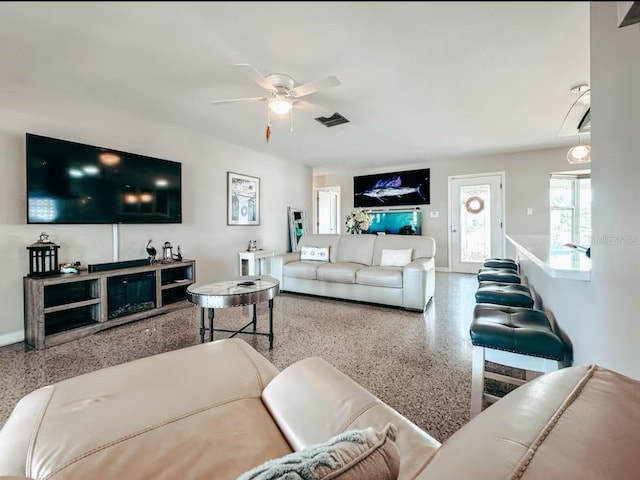 living room with ceiling fan