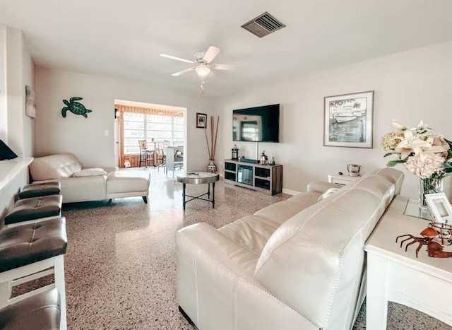 living room with ceiling fan