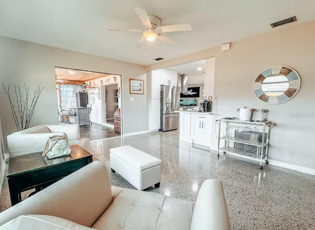 living room with ceiling fan