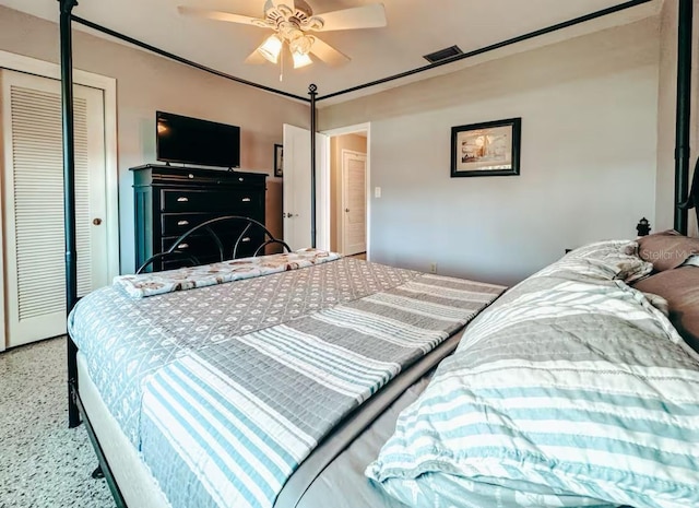 bedroom with carpet flooring, a closet, and ceiling fan