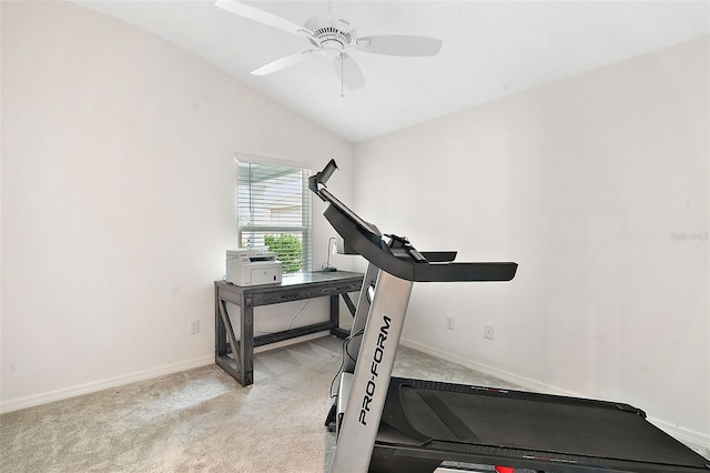 workout area featuring light carpet, ceiling fan, and lofted ceiling