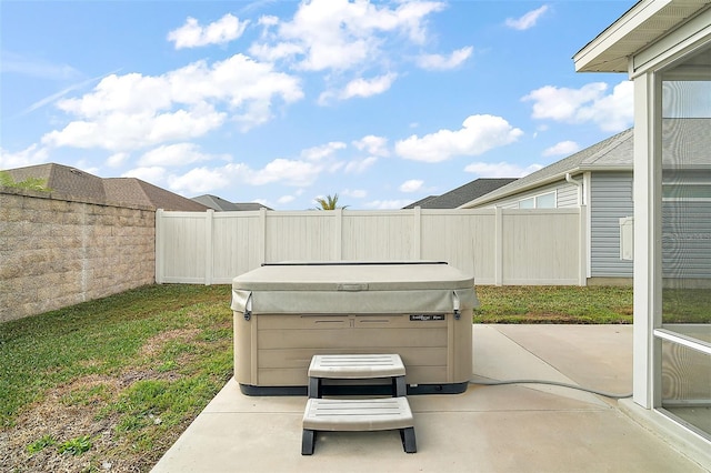 view of patio with a hot tub