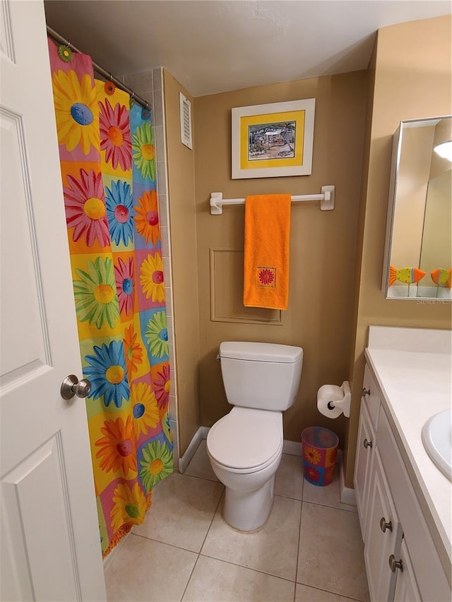 bathroom featuring tile patterned floors, vanity, toilet, and a shower with curtain