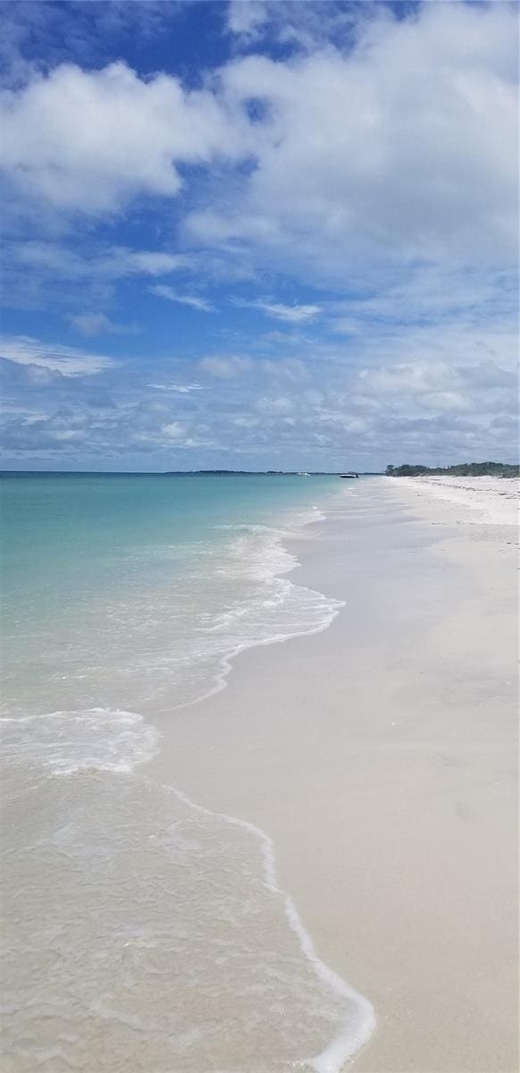 property view of water featuring a view of the beach