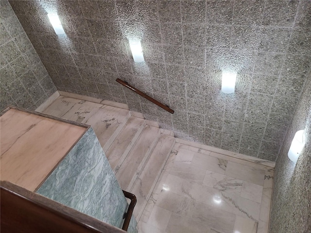 interior space with a tile shower