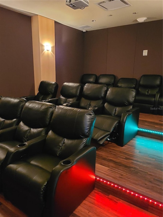 home theater with wood-type flooring