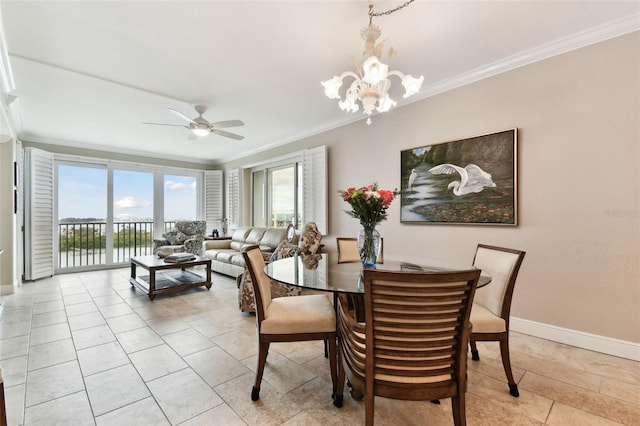 dining area with crown molding and ceiling fan with notable chandelier