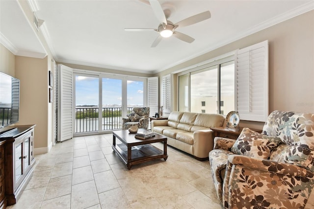 living room with ornamental molding, ceiling fan, and a water view