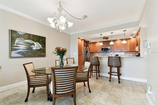 dining space with a notable chandelier and crown molding