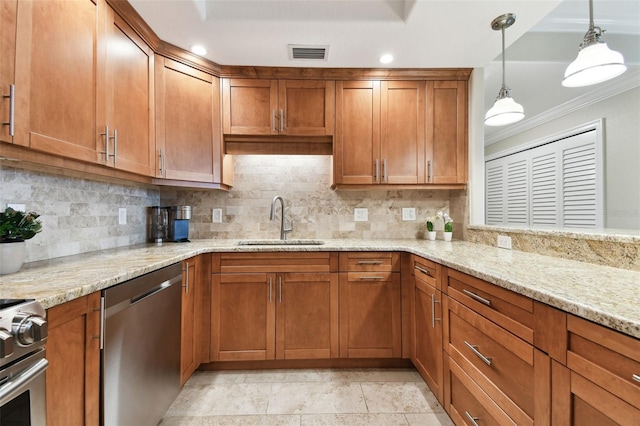 kitchen featuring sink, light stone counters, decorative light fixtures, dishwasher, and backsplash