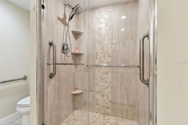 bathroom with walk in shower and toilet