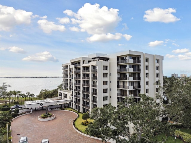 view of property with a water view