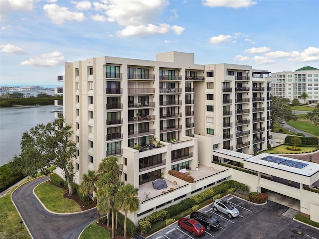 view of building exterior with a water view