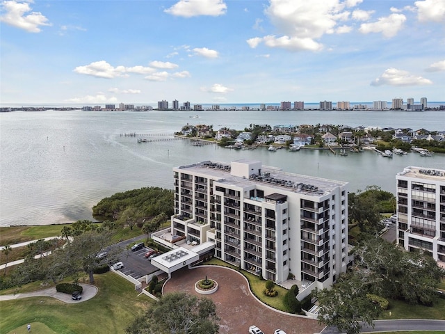 birds eye view of property with a water view