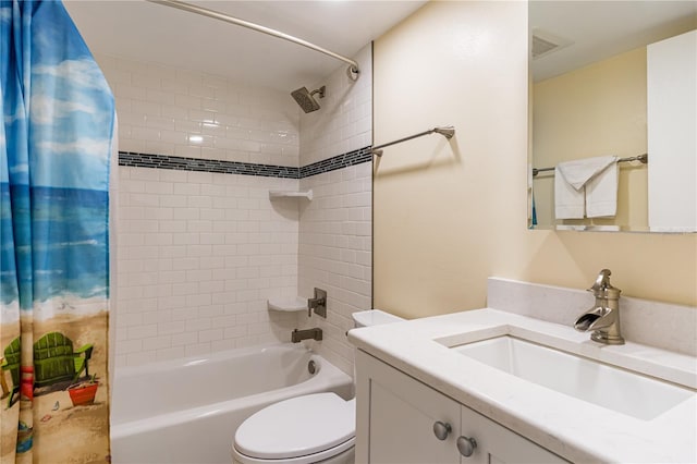 full bathroom with vanity, toilet, and shower / bath combo