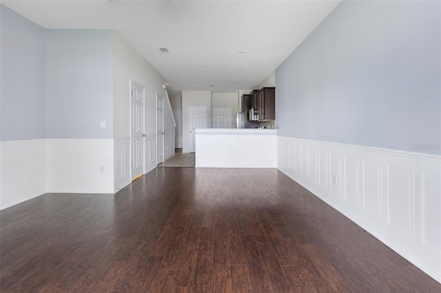 interior space with dark hardwood / wood-style flooring