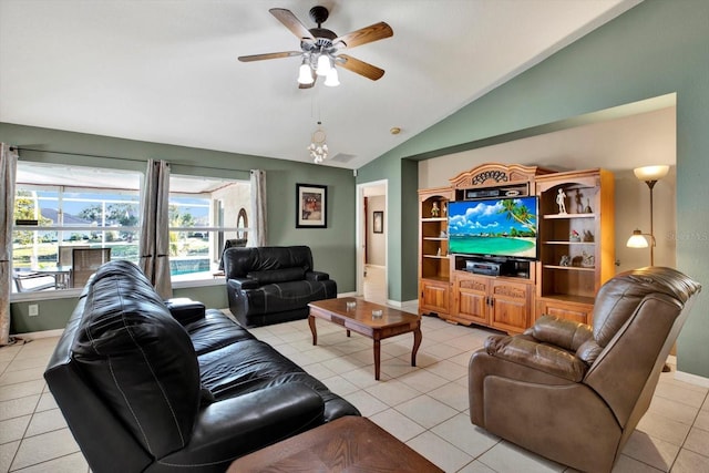 tiled living room featuring vaulted ceiling and ceiling fan