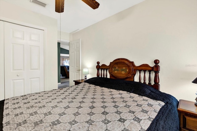 bedroom featuring ceiling fan and a closet