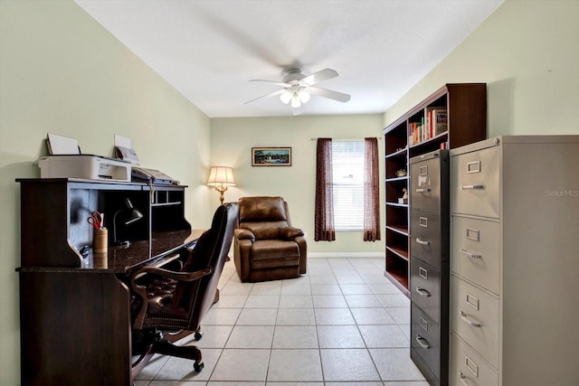 office space with ceiling fan and light tile patterned floors