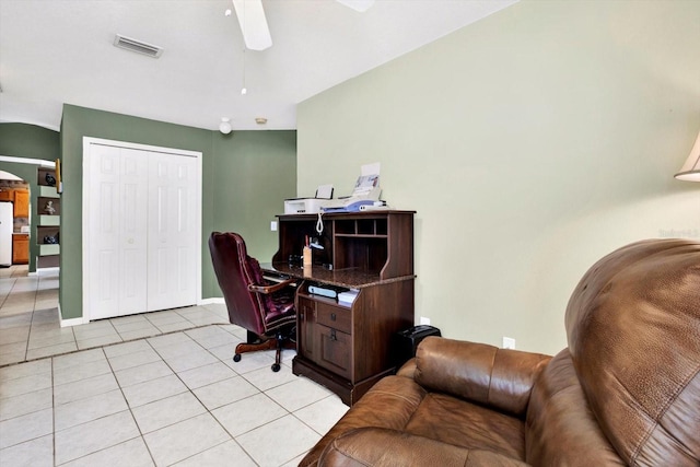 tiled office space with ceiling fan