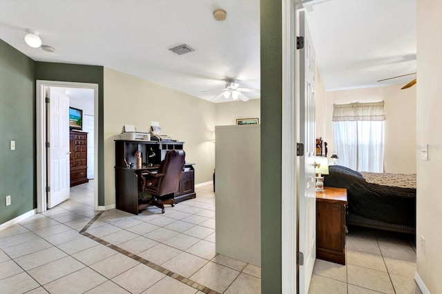 hall with light tile patterned flooring