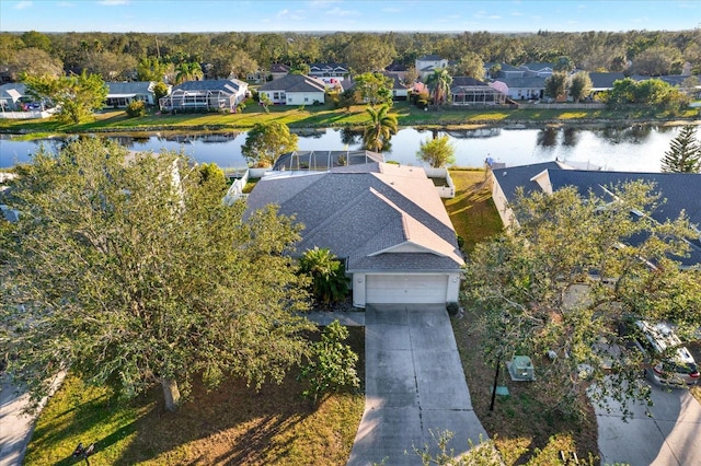 drone / aerial view with a water view