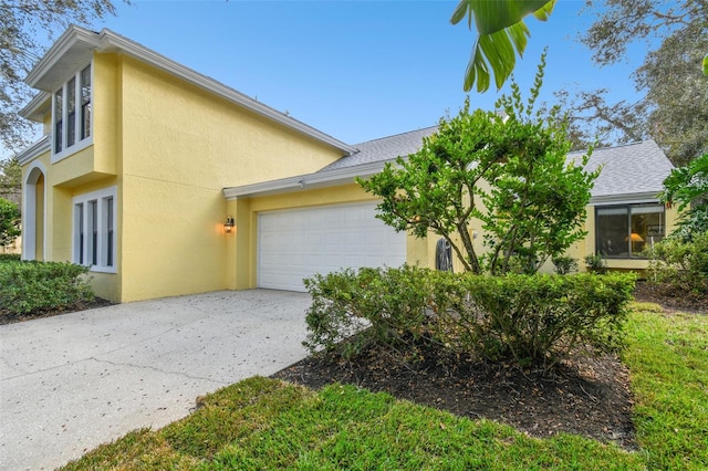 view of property exterior featuring a garage