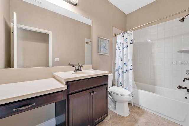 full bathroom featuring tile patterned flooring, vanity, shower / tub combo, and toilet