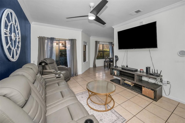 living room with light tile patterned floors, ceiling fan, and crown molding